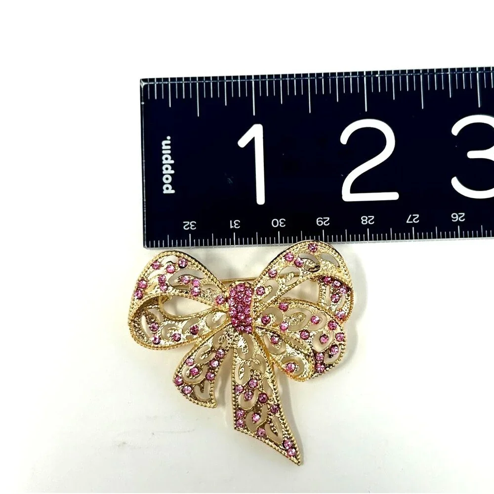 Fashion Goldtone Bow Brooch with Pink Rhinestones – Elegant‎ Openwork Design